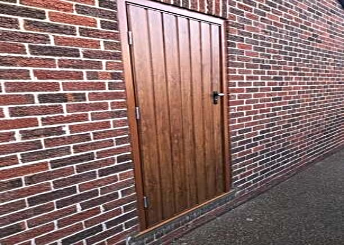 Pedestrian garage Door in Golden Oak 